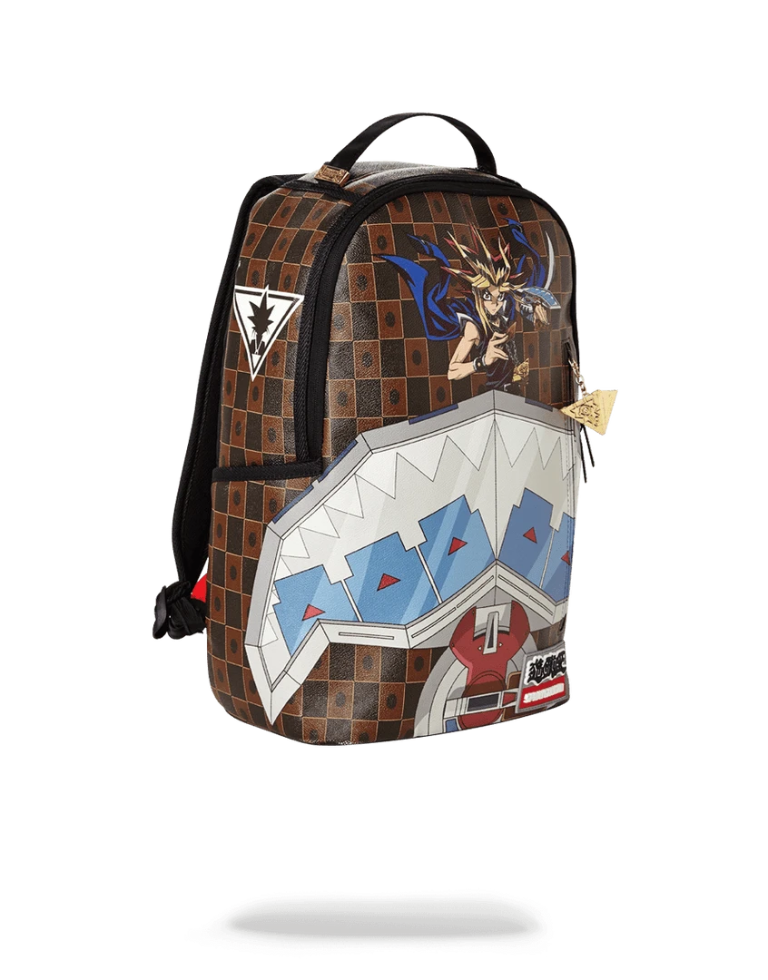 SPRAYGROUND® YU GI OH DUAL DISK SHARK BACKPACKS SPRAYGROUND® YU GI OH DUAL DISK SHARK BACKPACKS