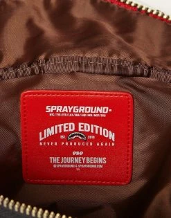 SPRAYGROUND® REVERSE SHARKS IN PARIS CROSSBODY (RED) CROSSBODYS