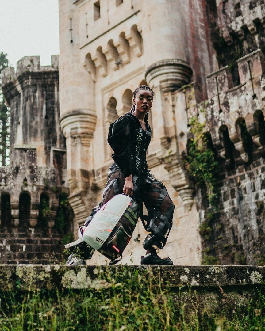 SPRAYGROUND® BAGS SPLIT WEIRD BACKPACK (DLXV) SPRAYGROUND® BAGS SPLIT WEIRD BACKPACK (DLXV)