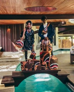 SPRAYGROUND® HENNY AIR TO THE THRONE SAVVY CROSSBODY CROSSBODYS