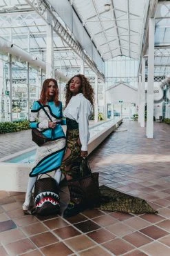 SPRAYGROUND® SHARKS AND SKULLS SAVVY CROSSBODY BAGS