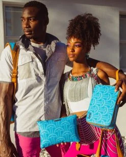 SPRAYGROUND® ILLUCHAINS TURQ CROSSOVER CLUTCH CROSSOVER CLUTCHES