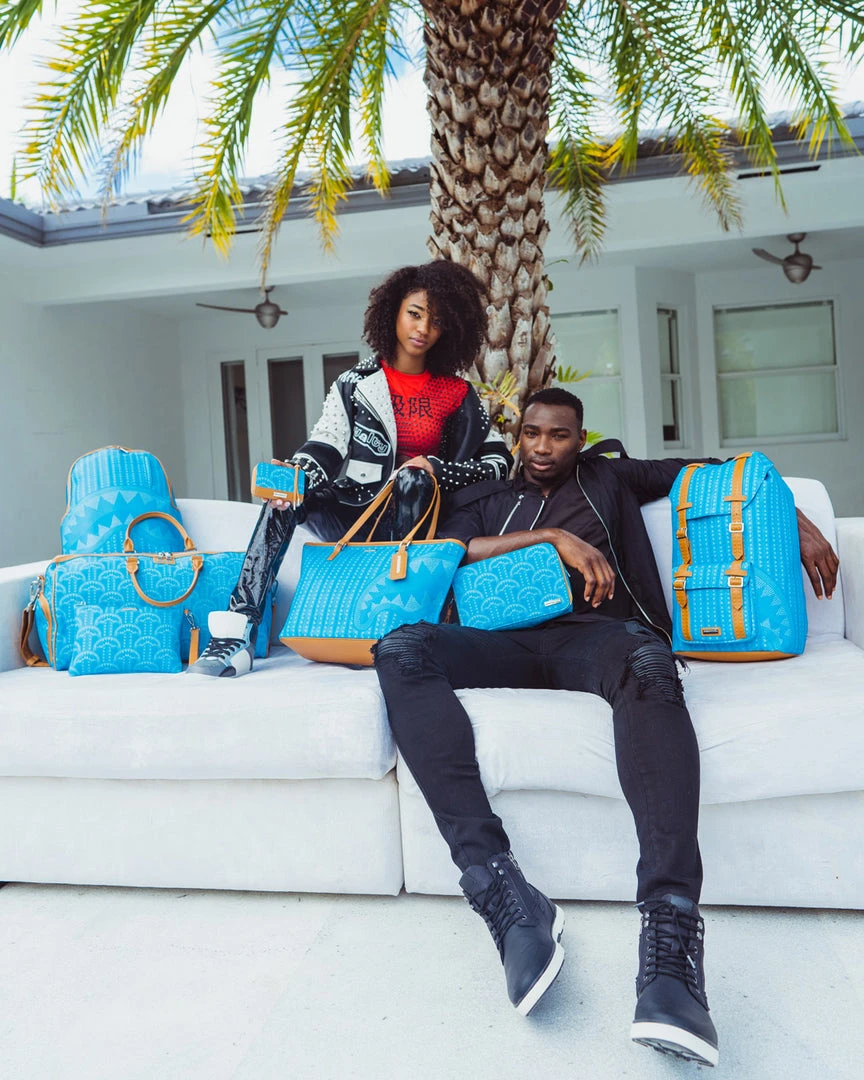 SPRAYGROUND® ILLUCHAINS TURQ TOILETRY BAG BAGS 4 SPRAYGROUND® ILLUCHAINS TURQ TOILETRY BAG BAGS