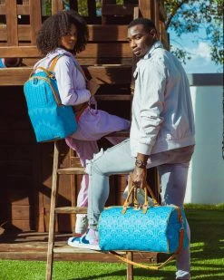 SPRAYGROUND® ILLUCHAINS TURQ BACKPACK (DLXV) BAGS