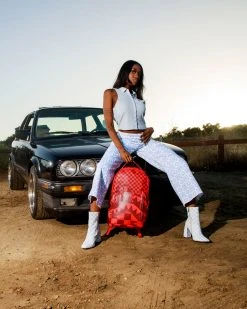 SPRAYGROUND® XTC SHARKS IN WONDERLAND BACKPACK (DLXV)