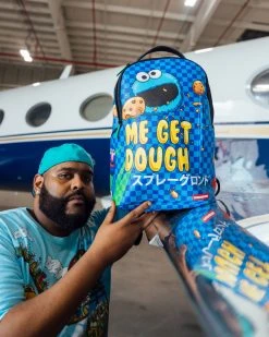SPRAYGROUND® NEW ARRIVALS COOKIE MONSTER ME GET DOUGH (DLXV)