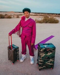 SPRAYGROUND® JUNGLE PARIS 29.5” FULL-SIZE SHARKITECTURE LUGGAGE FULL-SIZE LUGGAGE 35 SPRAYGROUND® JUNGLE PARIS 29.5” FULL-SIZE SHARKITECTURE LUGGAGE FULL-SIZE LUGGAGE