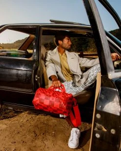 SPRAYGROUND® XTC SHARKS IN WONDERLAND DUFFLE