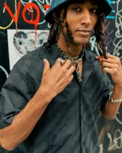 SPRAYGROUND® SPRAYGROUND INFINITI REFLECTIVE SHORT-SLEEVE BUTTON DOWN APPAREL+GEAR