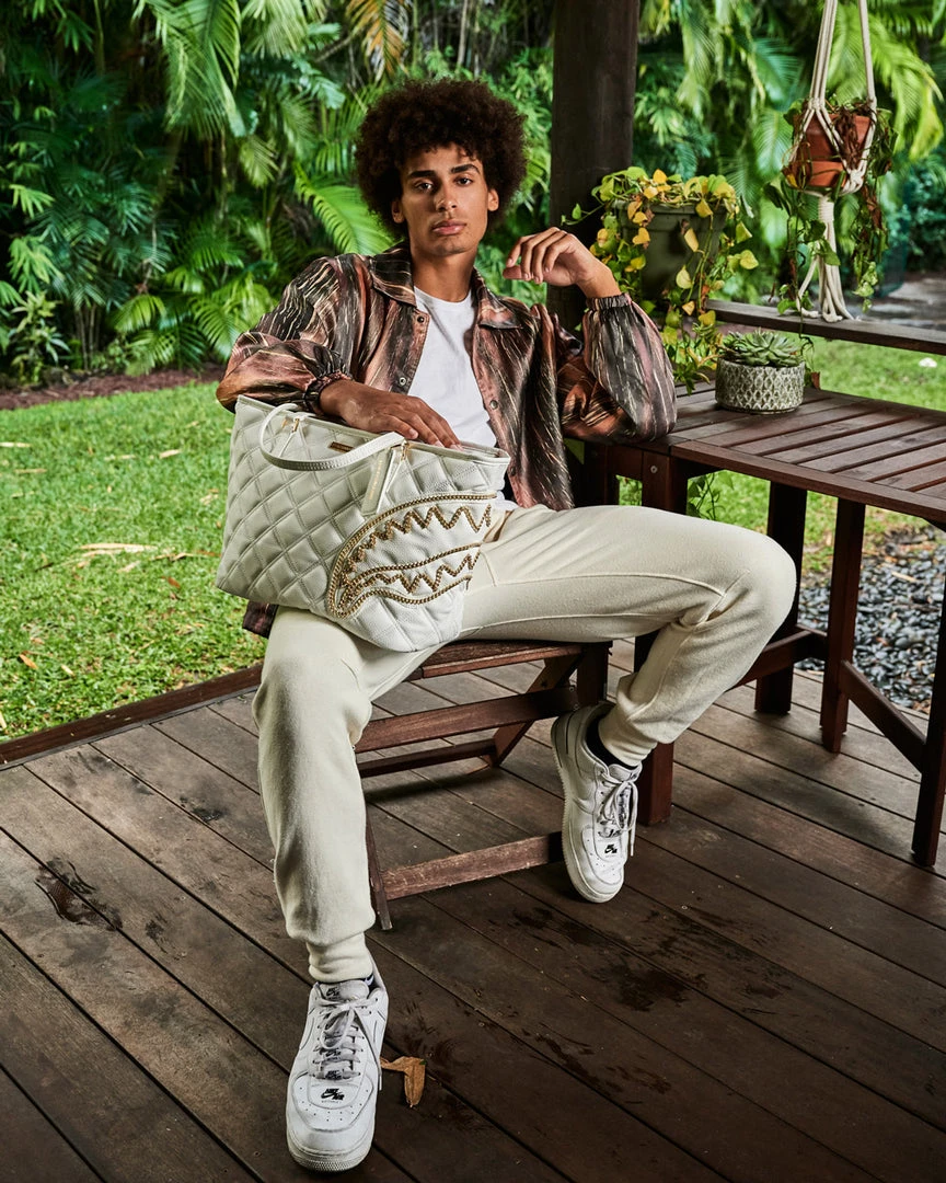 SPRAYGROUND® RIVIERA LE BLANC GOLD CHAIN SHARK TOTE 8 SPRAYGROUND® RIVIERA LE BLANC GOLD CHAIN SHARK TOTE