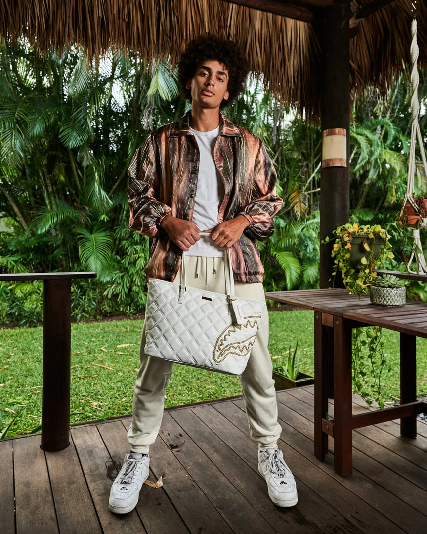 SPRAYGROUND® RIVIERA LE BLANC GOLD CHAIN SHARK TOTE 9 SPRAYGROUND® RIVIERA LE BLANC GOLD CHAIN SHARK TOTE