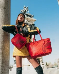 SPRAYGROUND® MONEYGRAM BRICK TOTE BAGS