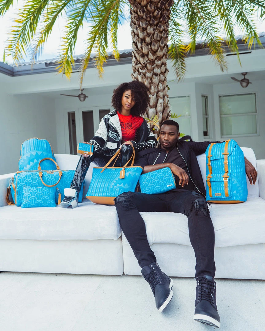 SPRAYGROUND® ILLUCHAINS TURQ TOTE BAGS 12 SPRAYGROUND® ILLUCHAINS TURQ TOTE BAGS