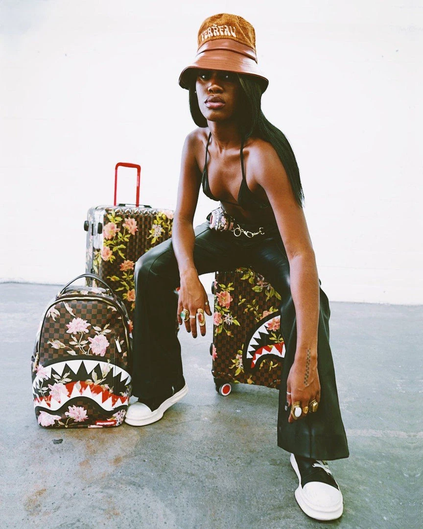 SPRAYGROUND® SHARKFLOWER 29.5” FULL-SIZE SHARKNAUTICS LUGGAGE FULL-SIZE LUGGAGE SPRAYGROUND® SHARKFLOWER 29.5” FULL-SIZE SHARKNAUTICS LUGGAGE FULL-SIZE LUGGAGE