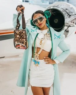 SPRAYGROUND® SHARKFLOWER CROSSBODY SLING 14 SPRAYGROUND® SHARKFLOWER CROSSBODY SLING